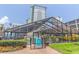 Indoor pool area features lush landscaping, a glass enclosure, and a gated entrance for safety at 2301 S Ocean Blvd. # 130, Myrtle Beach, SC 29577