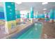 Scenic lazy river with marine-themed decor, seamlessly blending recreation and art at 2301 S Ocean Blvd. # 130, Myrtle Beach, SC 29577