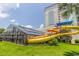 Fun waterslides offer an exhilarating experience next to the indoor pool and lush landscaping at 2301 S Ocean Blvd. # 130, Myrtle Beach, SC 29577
