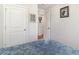 Bedroom featuring a comfortable bed and hallway with framed artwork on the walls at 231 Jeff Waters Circle, Longs, SC 29568