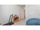 Bedroom with a treadmill and view of the hallway at 231 Jeff Waters Circle, Longs, SC 29568