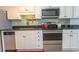 Efficient kitchen space with stainless appliances and black countertops at 2406 N Ocean Blvd. # 803, Myrtle Beach, SC 29577