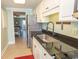 Modern kitchen featuring stainless steel appliances and dark countertops at 2406 N Ocean Blvd. # 803, Myrtle Beach, SC 29577