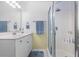 Well-lit bathroom featuring a glass shower door and a spacious vanity at 255 Tibton Circle, Myrtle Beach, SC 29588