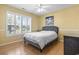 Cozy bedroom with natural light and a ceiling fan at 255 Tibton Circle, Myrtle Beach, SC 29588