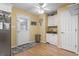 Bright kitchen featuring white cabinets and a stainless steel trash can at 255 Tibton Circle, Myrtle Beach, SC 29588