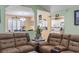 Cozy living room showcasing brown leather reclining furniture, creating a comfortable and inviting space at 255 Tibton Circle, Myrtle Beach, SC 29588