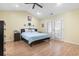 Spacious main bedroom features light hardwood floors and double French doors at 255 Tibton Circle, Myrtle Beach, SC 29588