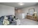 Upstairs sitting area with a comfortable couch and a modern decorative table at 269 Mayflower Dr., Calabash, NC 28467
