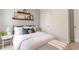 Comfortable bedroom with soft carpet, accent wallpaper, and a plush bed at 2884 Riverboat Way, Conway, SC 29526