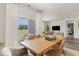 Dining area with sliding doors to patio, connecting indoor/outdoor living, alongside the modern decor at 2884 Riverboat Way, Conway, SC 29526