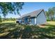 The backyard includes a patio, grill, and lots of space at 294 Field Loop Rd., Georgetown, SC 29440