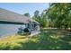 The backyard includes a patio, grill, and lots of space at 294 Field Loop Rd., Georgetown, SC 29440
