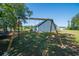 Spacious backyard featuring a swing set, trampoline, and other fun activities at 294 Field Loop Rd., Georgetown, SC 29440
