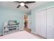Comfortable bedroom featuring a closet, television, and light blue walls at 294 Field Loop Rd., Georgetown, SC 29440