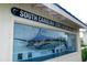 Display of a South Carolina State Record Blue Marlin in a glass case with details about the catch at 294 Field Loop Rd., Georgetown, SC 29440