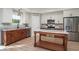 Bright, modern kitchen featuring stainless steel appliances and a large island at 294 Field Loop Rd., Georgetown, SC 29440