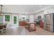 Modern kitchen featuring granite counters, an island, stainless steel appliances and a view to the outdoors at 294 Field Loop Rd., Georgetown, SC 29440