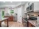 Modern kitchen with stainless appliances and granite countertops at 294 Field Loop Rd., Georgetown, SC 29440