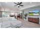 Open concept living room with modern kitchen appliances and a view of the front yard at 294 Field Loop Rd., Georgetown, SC 29440