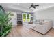 Bright living room with a large window and comfortable seating area at 294 Field Loop Rd., Georgetown, SC 29440