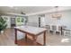 Open-concept living area with a kitchen island and natural light at 294 Field Loop Rd., Georgetown, SC 29440