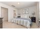 Comfortable main bedroom featuring neutral tones, carpet flooring, and ensuite bathroom at 296 Clear Lake Dr., Conway, SC 29526