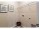Functional laundry room with a wire shelf and space-saving design at 304 Clear Lake Dr., Conway, SC 29526