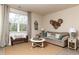 Inviting living room featuring a neutral color palette, large windows for natural light, and comfortable seating at 304 Clear Lake Dr., Conway, SC 29526