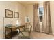 Cozy home office with a rustic wooden desk, chair, and window with natural light at 304 Clear Lake Dr., Conway, SC 29526