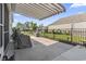 A spacious patio, perfect for grilling, overlooks the well-manicured and fenced backyard at 3056 Skylar Dr., Myrtle Beach, SC 29577