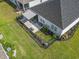 An aerial view showing a fenced-in backyard and patio with awning, perfect for outdoor entertaining at 3056 Skylar Dr., Myrtle Beach, SC 29577