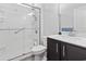 Modern bathroom with a glass-enclosed shower, sleek vanity, and a well-lit mirror at 3056 Skylar Dr., Myrtle Beach, SC 29577