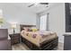 Cozy bedroom featuring a comfortable bed with stylish bedding and a ceiling fan at 3056 Skylar Dr., Myrtle Beach, SC 29577