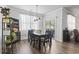 Bright dining area with modern furnishings, a stylish hutch, and natural light filtering through sheer curtains at 3056 Skylar Dr., Myrtle Beach, SC 29577