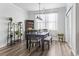 Cozy dining room with natural light, featuring stylish furnishings and decor, next to sliding glass doors at 3056 Skylar Dr., Myrtle Beach, SC 29577