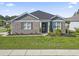 Charming single-story home with manicured lawn, brick facade, and dark shutters at 3056 Skylar Dr., Myrtle Beach, SC 29577