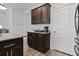 Kitchen area featuring custom cabinets, a built-in coffee bar, and granite countertops at 3056 Skylar Dr., Myrtle Beach, SC 29577