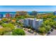 Beautiful aerial view of condo building, showcasing nearby beach and lush greenery at 311 71St Ave. N # 5A, Myrtle Beach, SC 29572