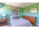 Inviting bedroom with hardwood floors, neutral tones, and ample closet space, creating a serene and relaxing atmosphere at 311 71St Ave. N # 5A, Myrtle Beach, SC 29572