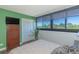 Cozy bedroom with hardwood floors, a large window and ample storage space, providing a comfortable and functional layout at 311 71St Ave. N # 5A, Myrtle Beach, SC 29572
