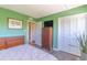 Bright bedroom featuring a large window, hardwood floors and ample closet space, creating a comfortable and functional living space at 311 71St Ave. N # 5A, Myrtle Beach, SC 29572