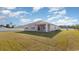 Spacious backyard features a large lawn and a patio, perfect for outdoor living and entertaining at 312 Clear Lake Dr., Conway, SC 29526