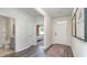 Bright entryway showcases hardwood floors, fresh paint, and convenient access to the main living areas at 312 Clear Lake Dr., Conway, SC 29526
