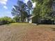 Expansive backyard with lush greenery, mature trees, and a well-maintained lawn, perfect for outdoor enjoyment at 314 Trace Run, Myrtle Beach, SC 29588