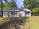 Charming single-story home with a well-maintained yard, complemented by a detached storage shed at 314 Trace Run, Myrtle Beach, SC 29588