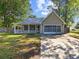 Charming single-story home with a welcoming front porch and screened in garage in a mature neighborhood at 314 Trace Run, Myrtle Beach, SC 29588