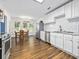 Bright kitchen with stainless appliances, modern cabinets, lots of natural light, and an adjacent dining area at 314 Trace Run, Myrtle Beach, SC 29588