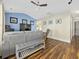 Inviting living room with hardwood floors, a comfortable sofa, and a wall-mounted television at 314 Trace Run, Myrtle Beach, SC 29588