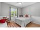 Bright bedroom with hardwood floors and ample natural light at 3157 Hermitage Dr., Little River, SC 29566